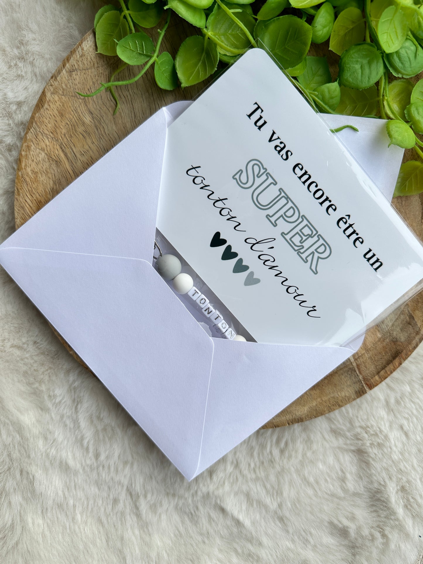 Annonce grossesse tonton carte avec petit porte clés perles grises